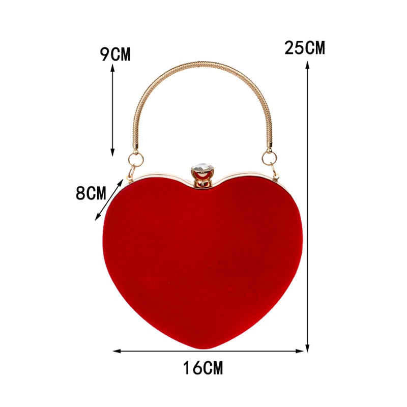 حقيبة يد مخملية ذهبية بتصميم قلب أحمر