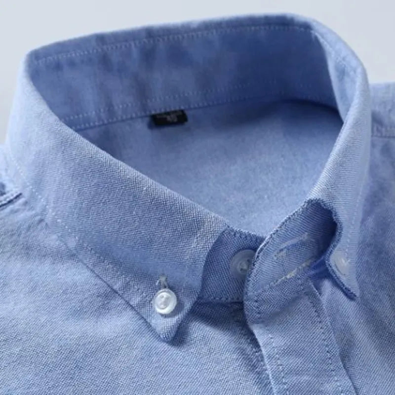 Camisa de algodón azul con bolsillos